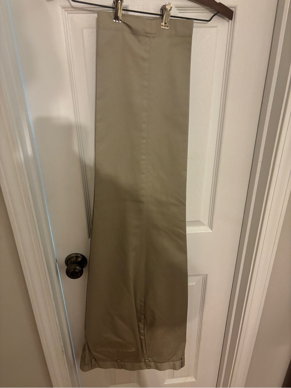 Brooks Brothers Chinos.  There is a small tear at the top of the right pocket.